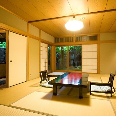 Ryotei Tanokura Hotel Yufu Exterior foto