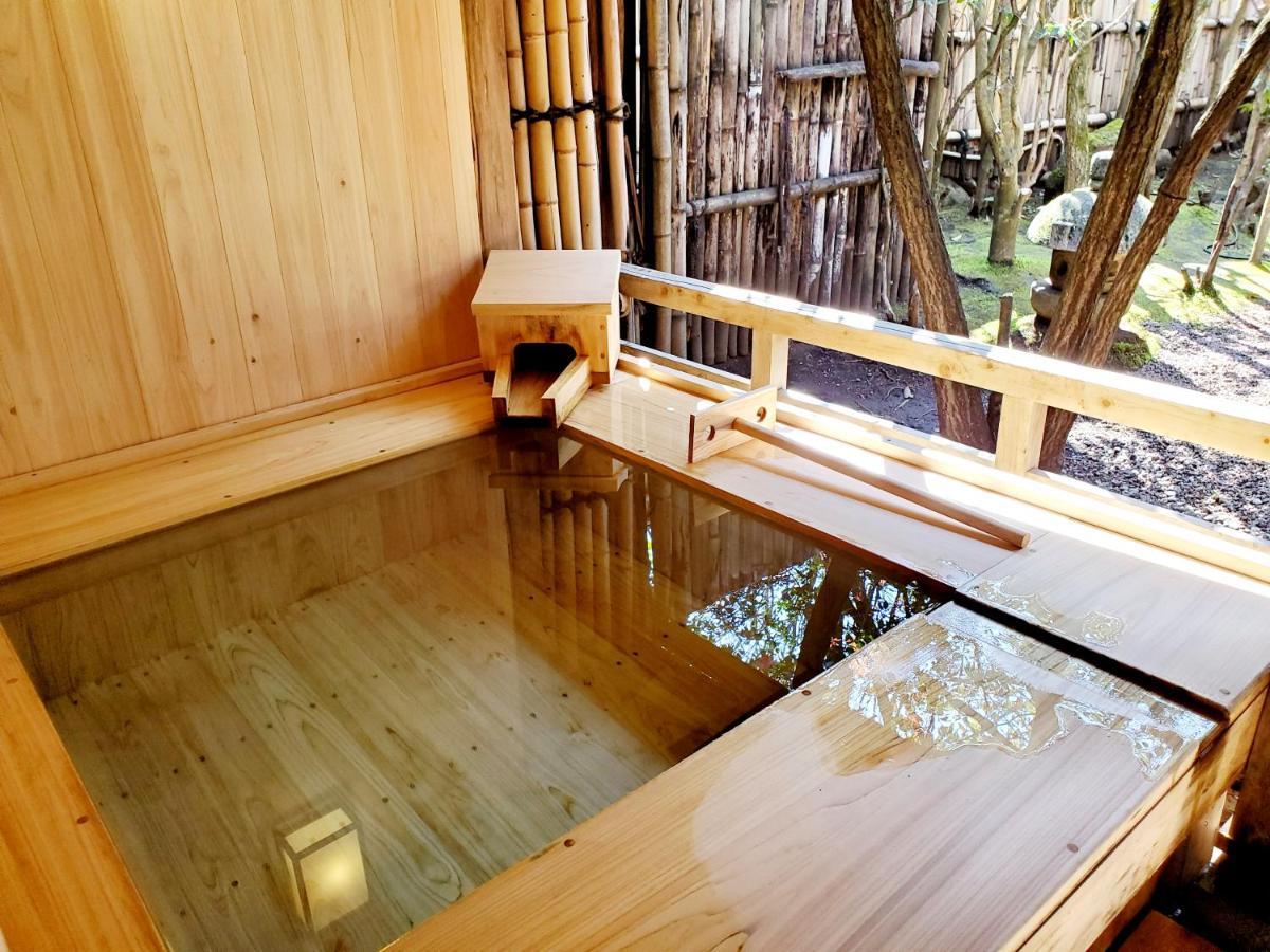 Ryotei Tanokura Hotel Yufu Exterior foto