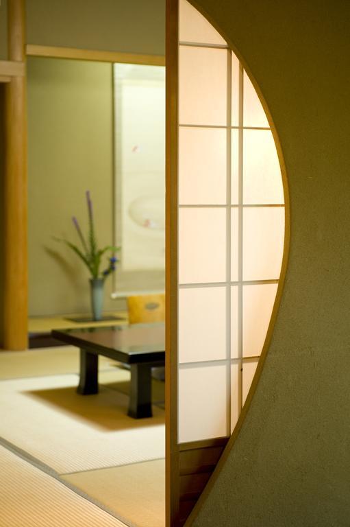 Ryotei Tanokura Hotel Yufu Exterior foto