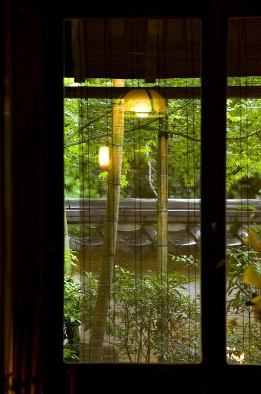 Ryotei Tanokura Hotel Yufu Exterior foto