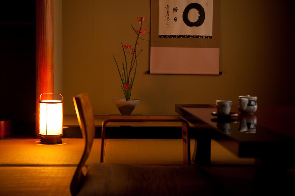 Ryotei Tanokura Hotel Yufu Exterior foto