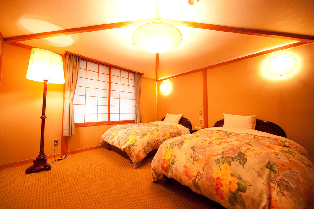 Ryotei Tanokura Hotel Yufu Exterior foto