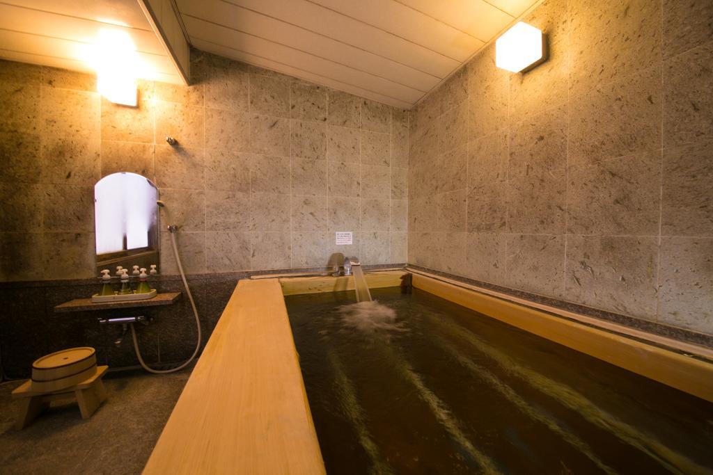 Ryotei Tanokura Hotel Yufu Exterior foto