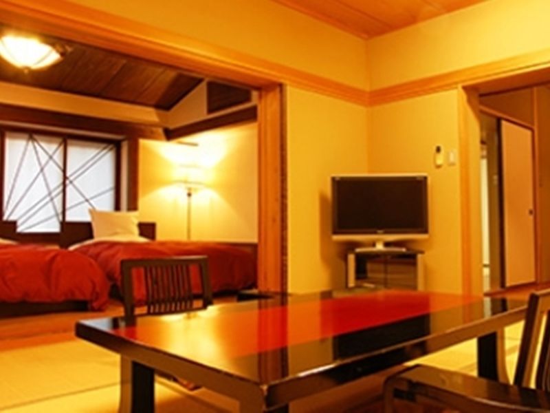 Ryotei Tanokura Hotel Yufu Exterior foto