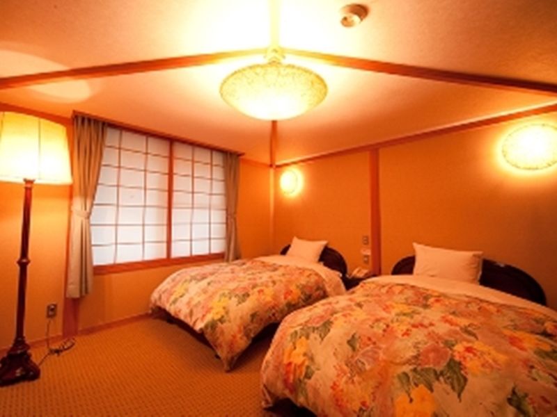 Ryotei Tanokura Hotel Yufu Exterior foto