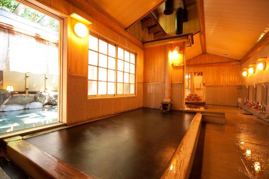 Ryotei Tanokura Hotel Yufu Exterior foto