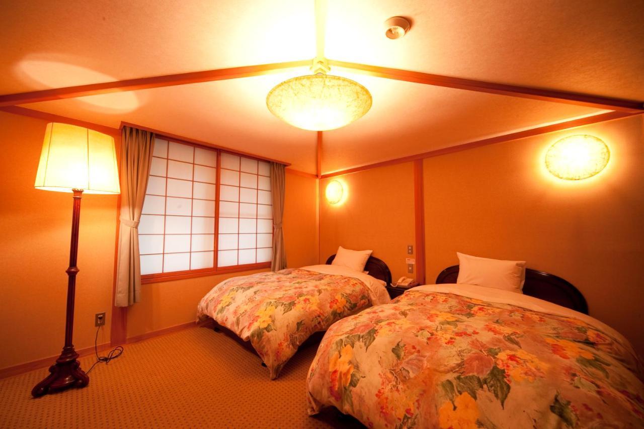 Ryotei Tanokura Hotel Yufu Exterior foto
